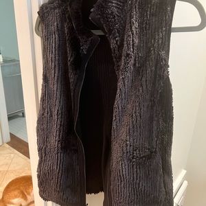 Black fur vest, Etcetera brand. No tag, zips in front. medium, about size 8-10.